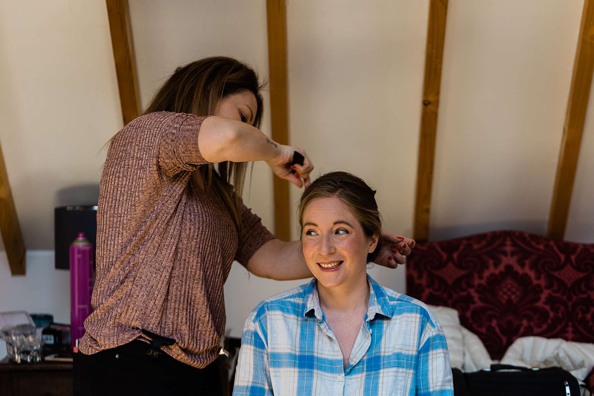 bridemaid having her hair brushed
