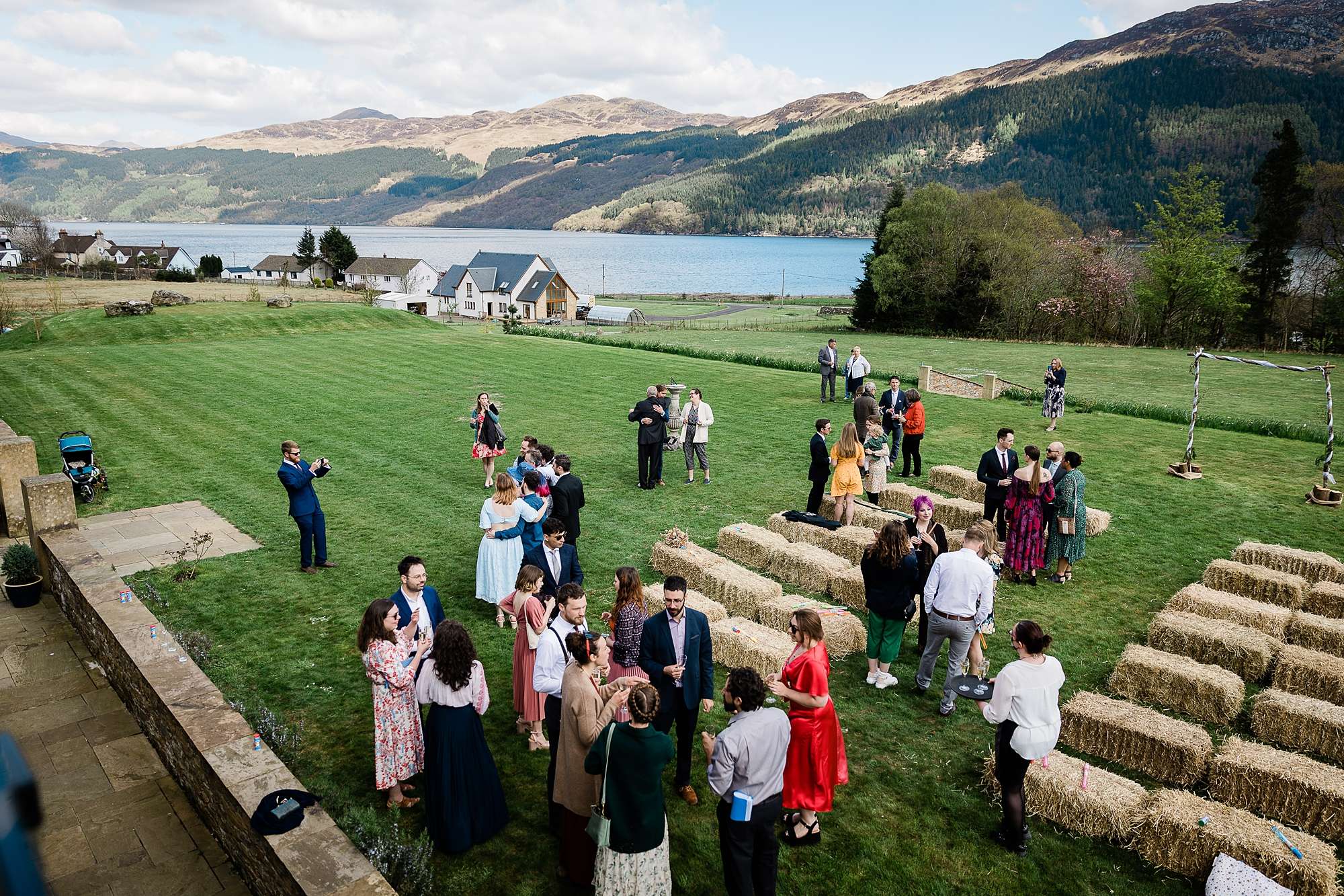 view of a wedding reception out on the lawn of Carrick Castle Estate