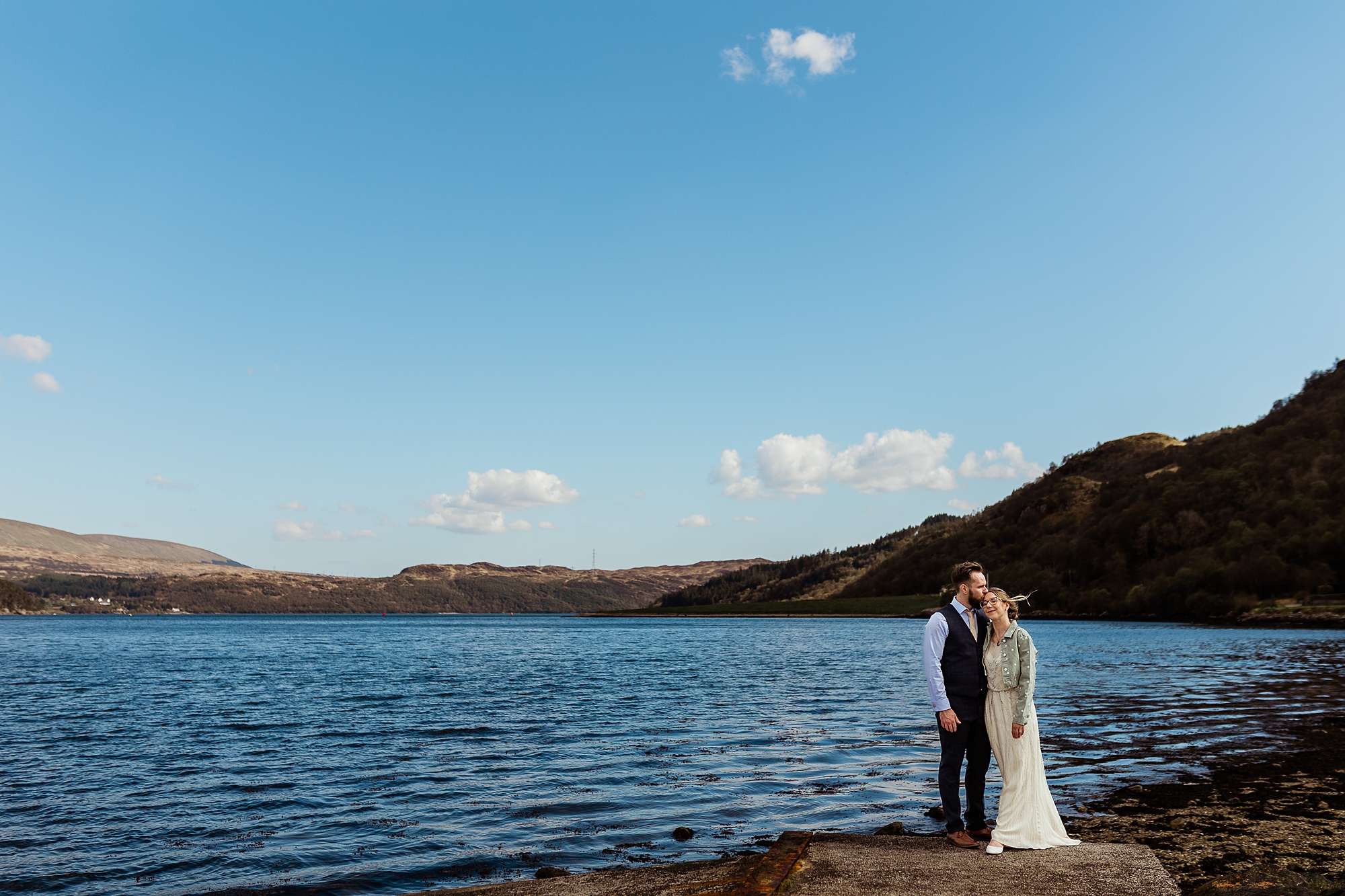 bride and groom on the shore of Loch Goil