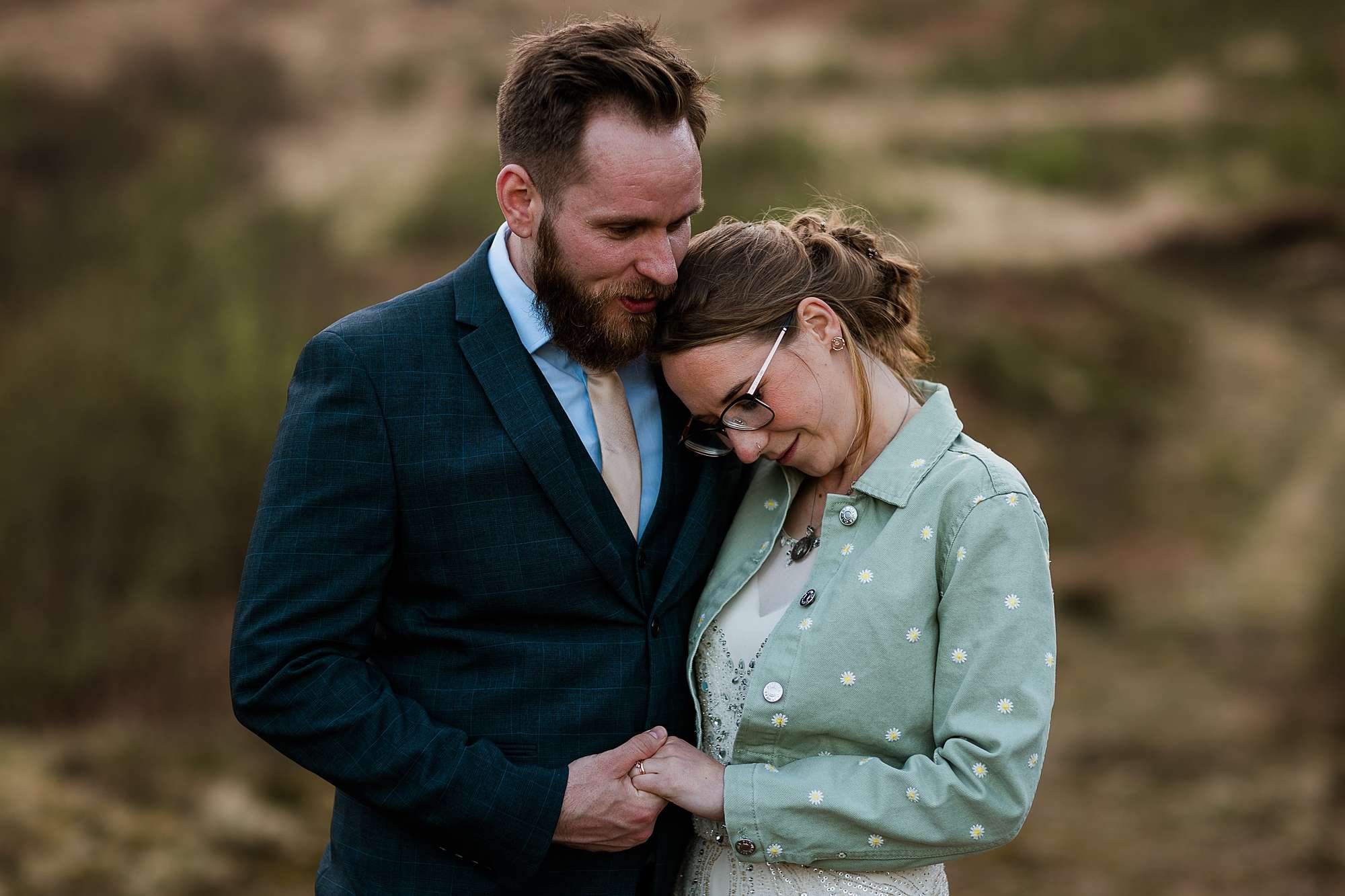 bride and groom embracing