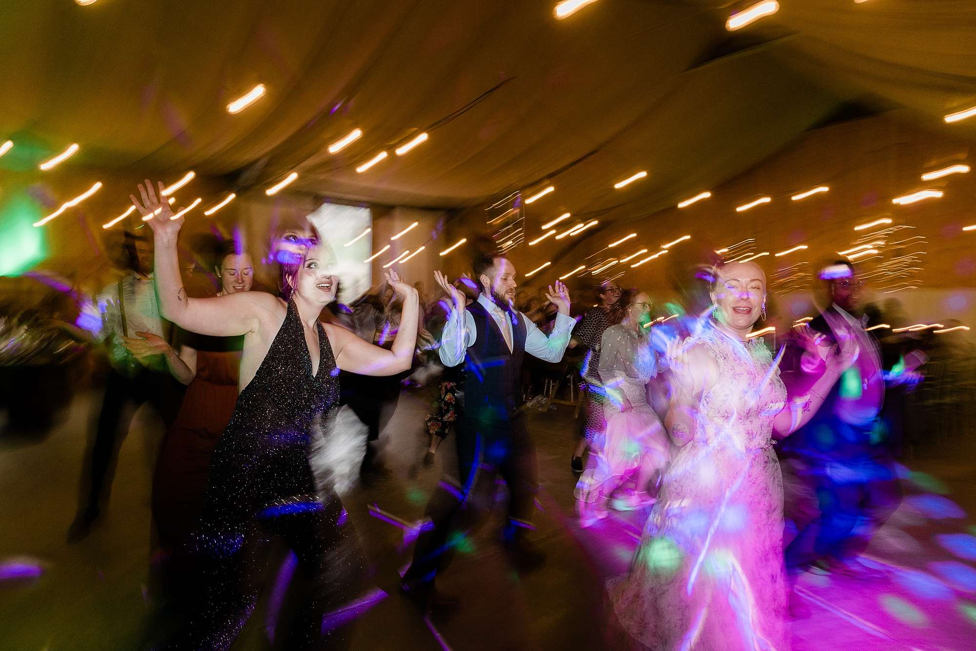 wedding guests dancing at a wedding at Carrick Castle Estate