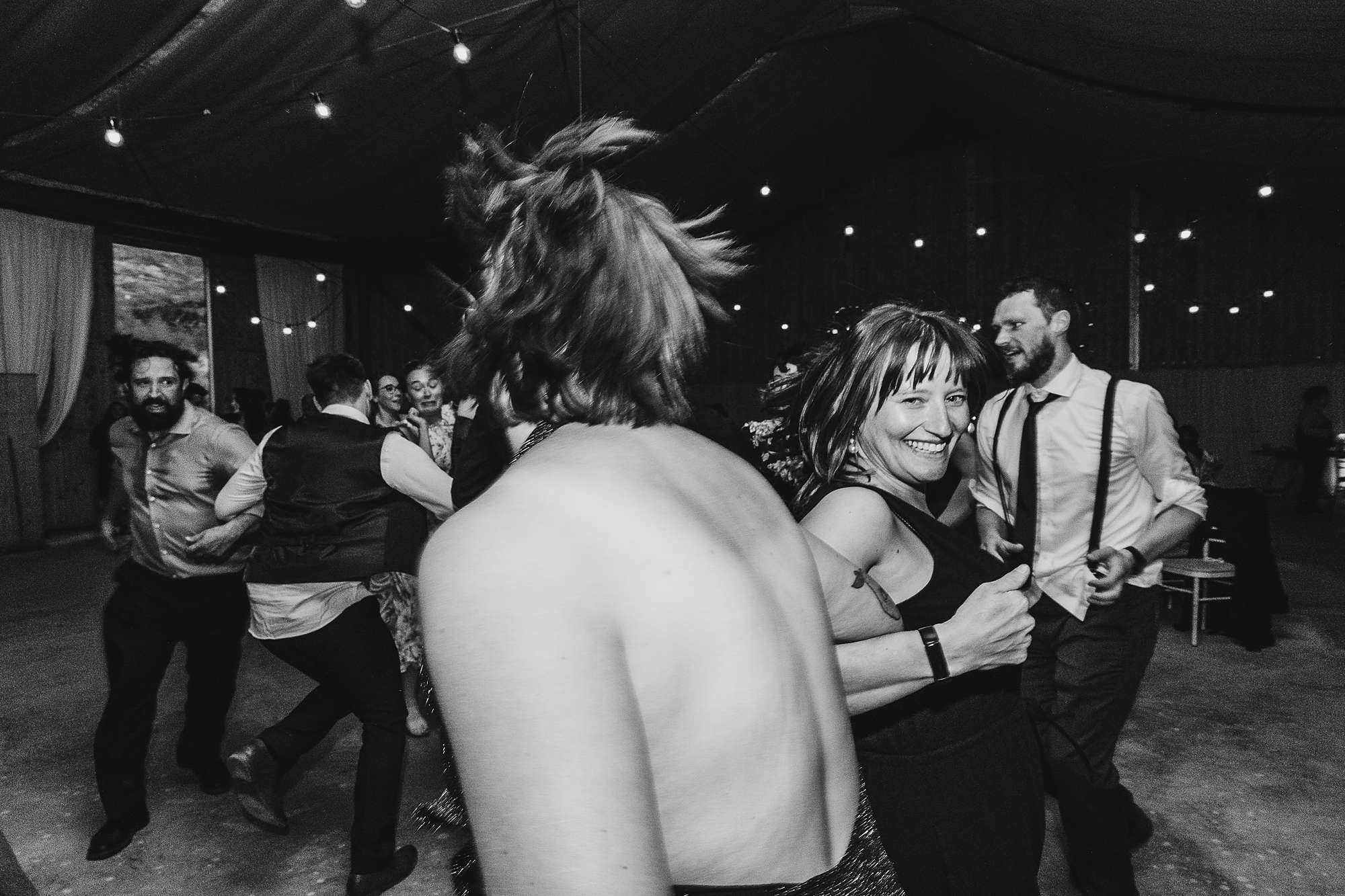 wedding guests dancing at a wedding at Carrick Castle Estate