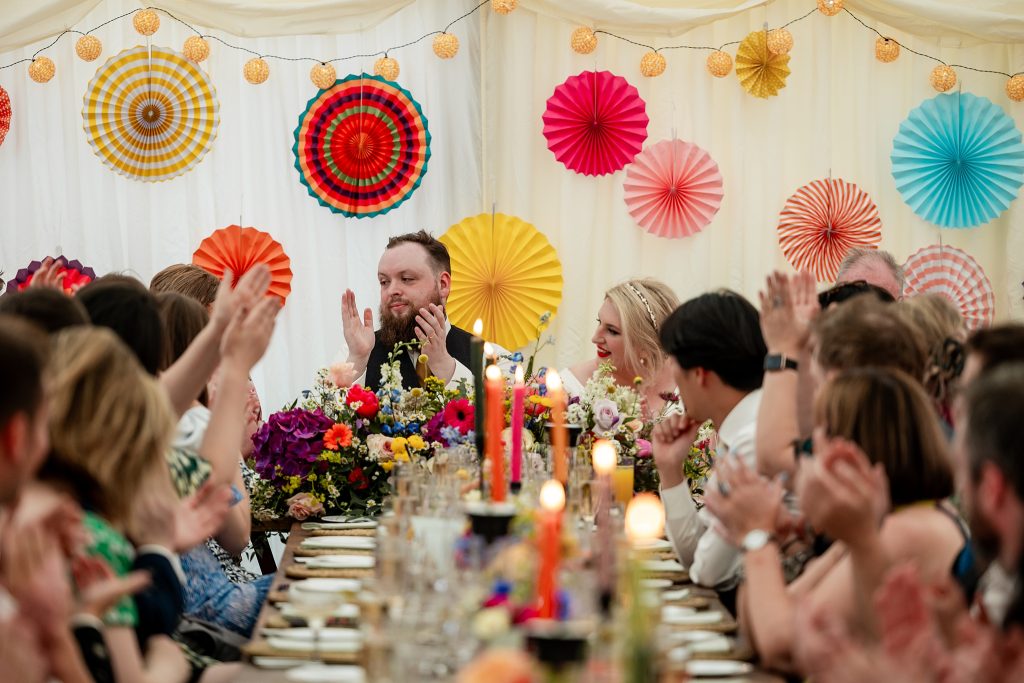 people clapping during a wedding speech  at a Scottish garden wedding in Renfrewshire