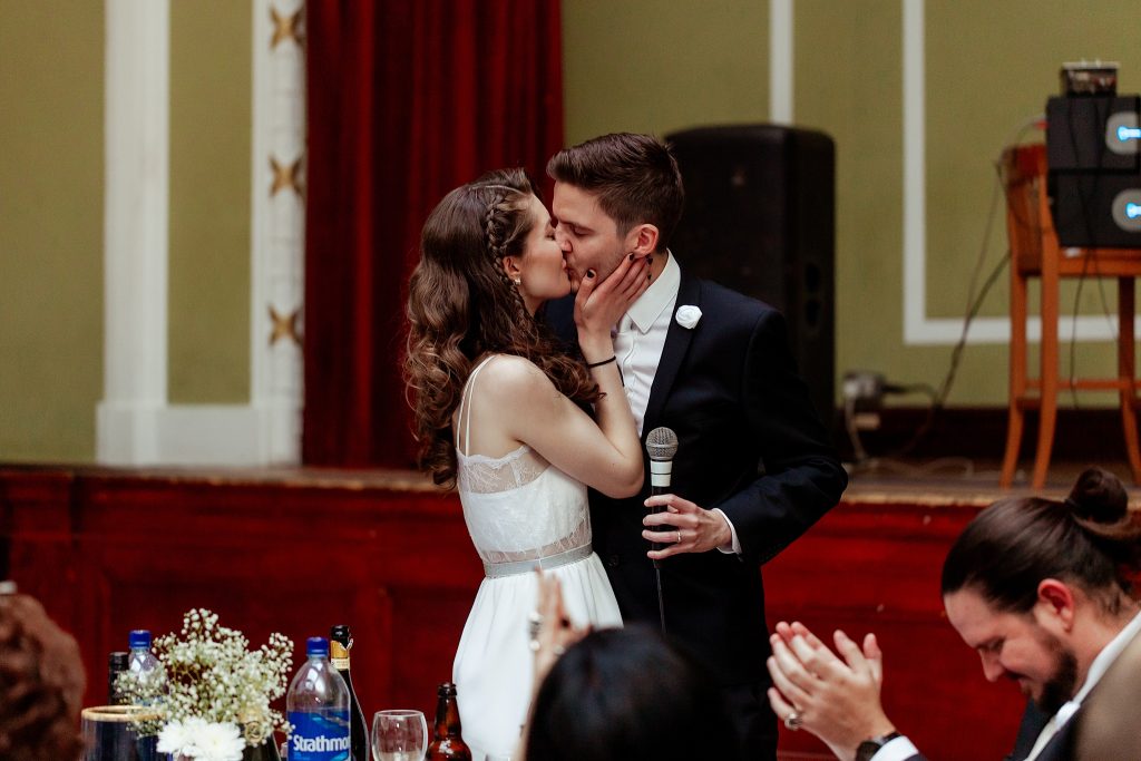 bride and groom sharing a kiss 