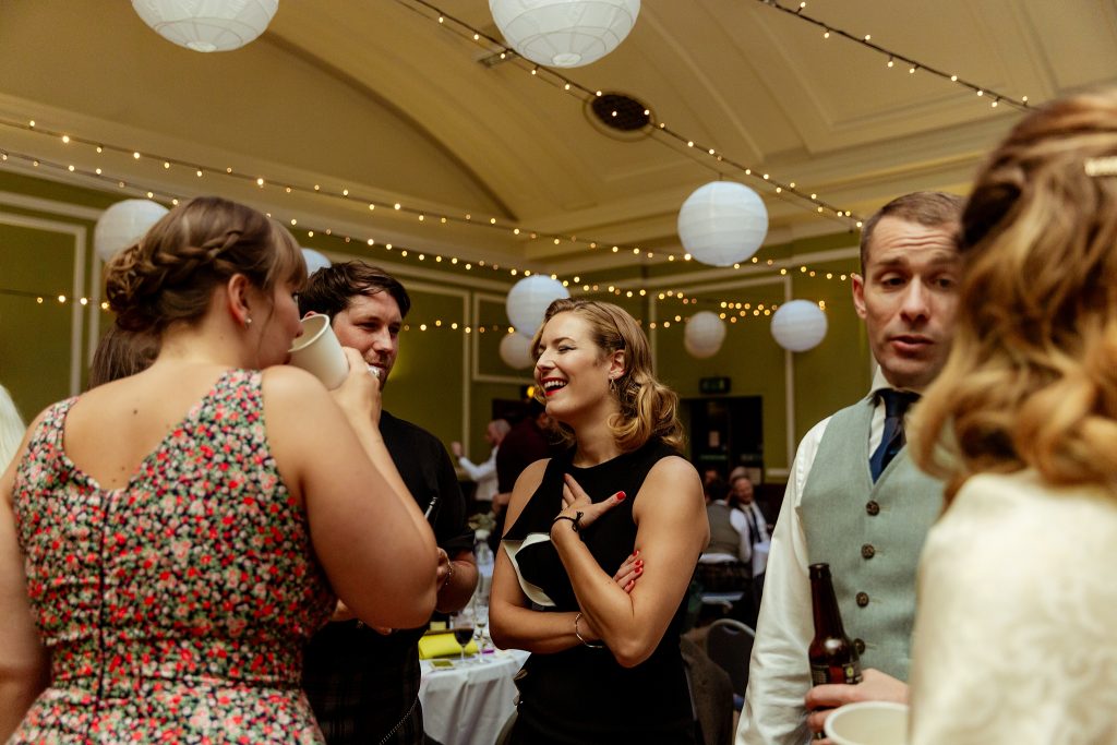 wedding guests mingling  at Thomas Morton Hall in Leith Theatre
