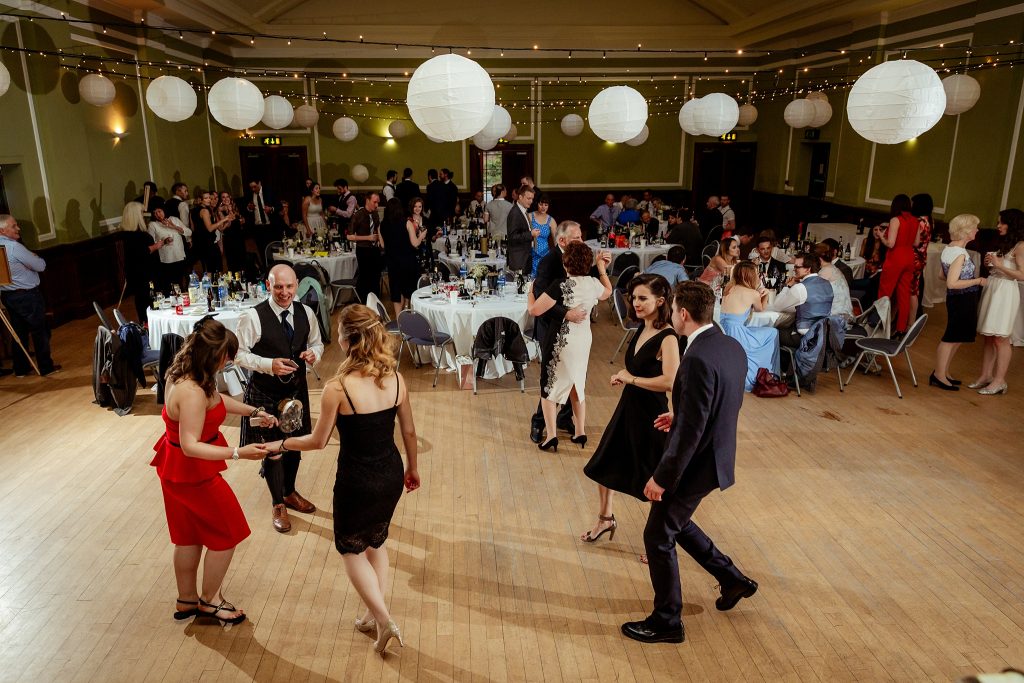 wedding guests dancing at Thomas Morton Hall