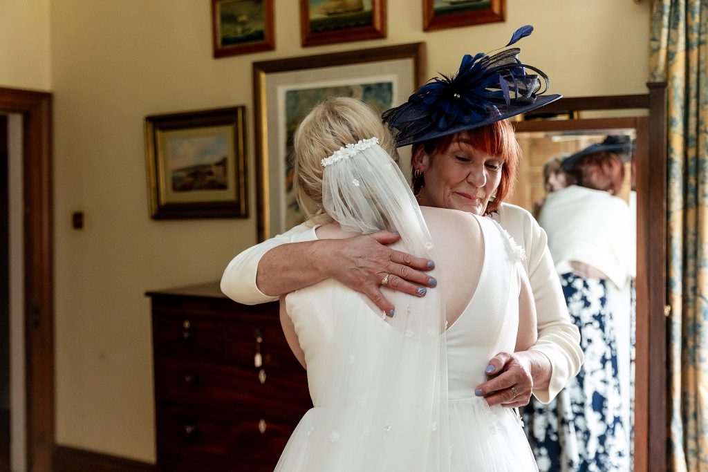 bride hugging her mum