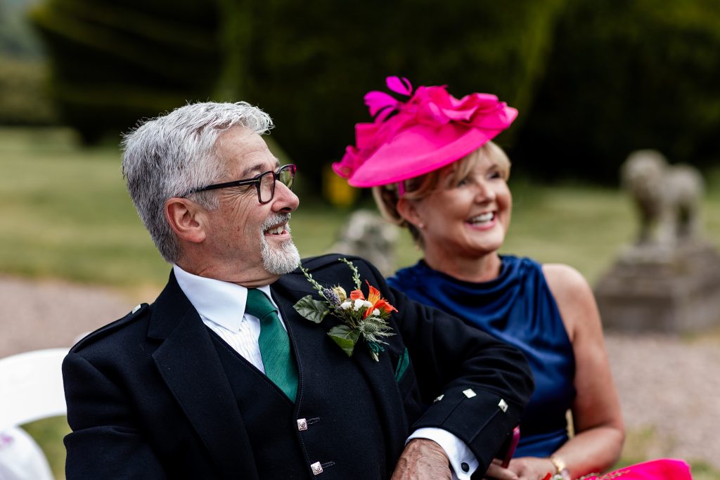 wedding guests at outdoor wedding ceremony at Fingask Castle