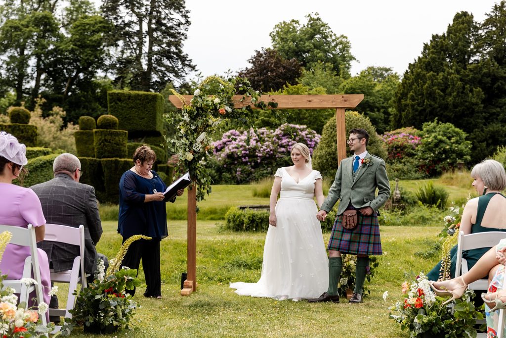 humanist celebrant at outdoor wedding ceremony at Fingask Castle
