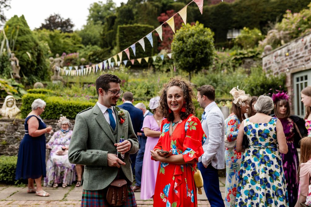 wedding guests mingling at outdoor wedding at Fingask Castle