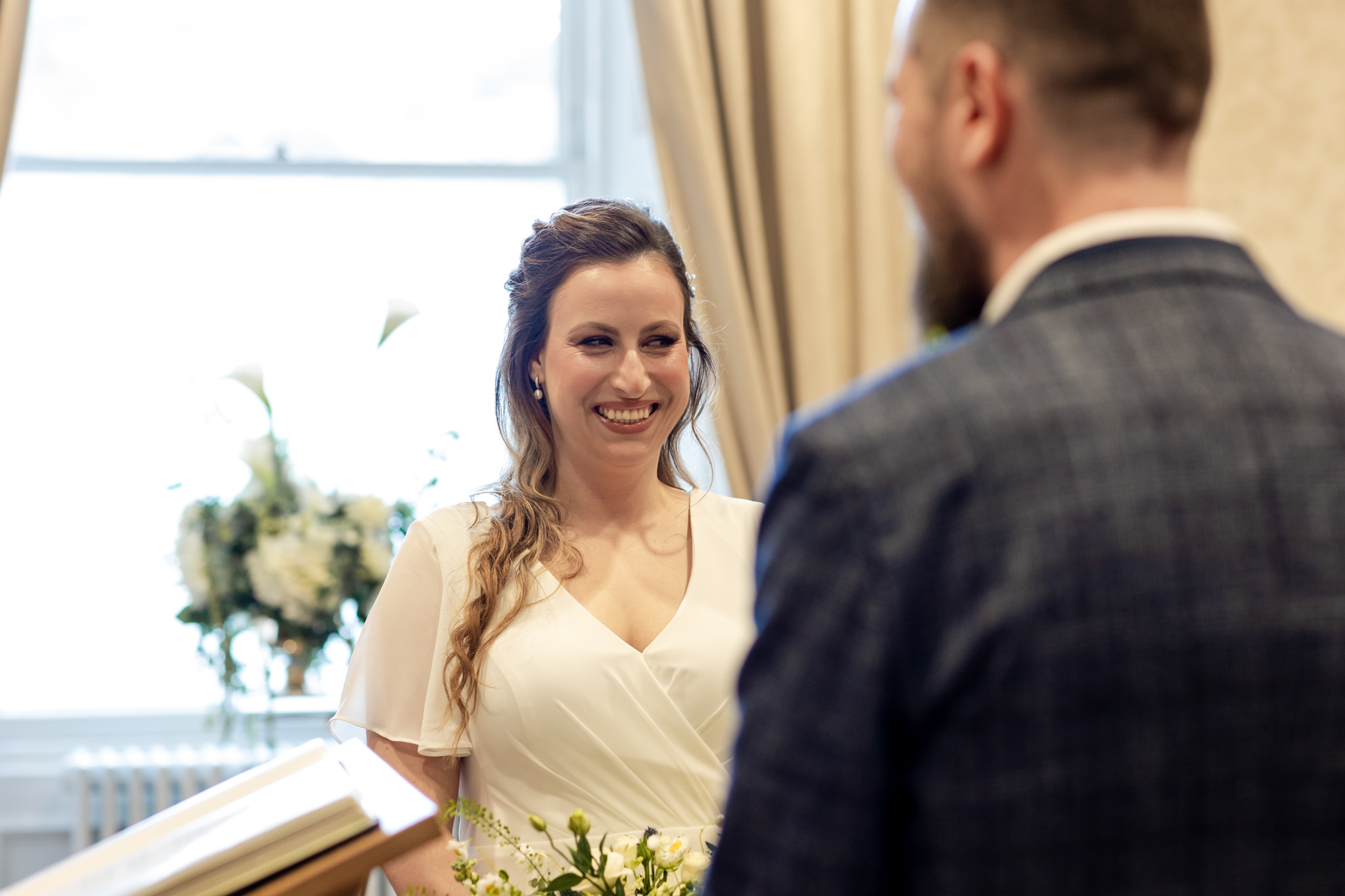 bride smiling at City Chambers wedding in Edinburgh