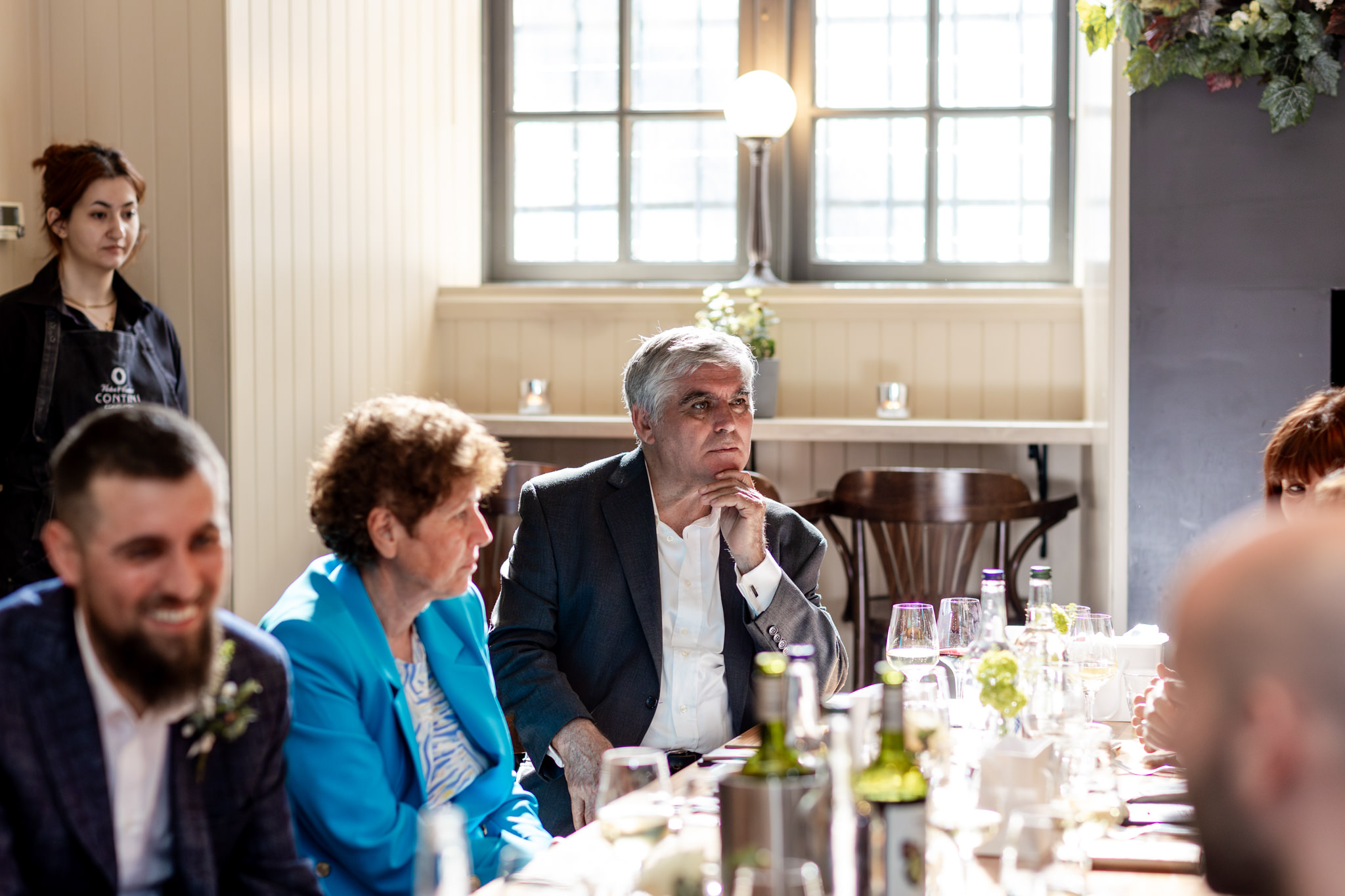 guests sitting chatting at wedding reception at Cannonball Restaurant in Edinburgh