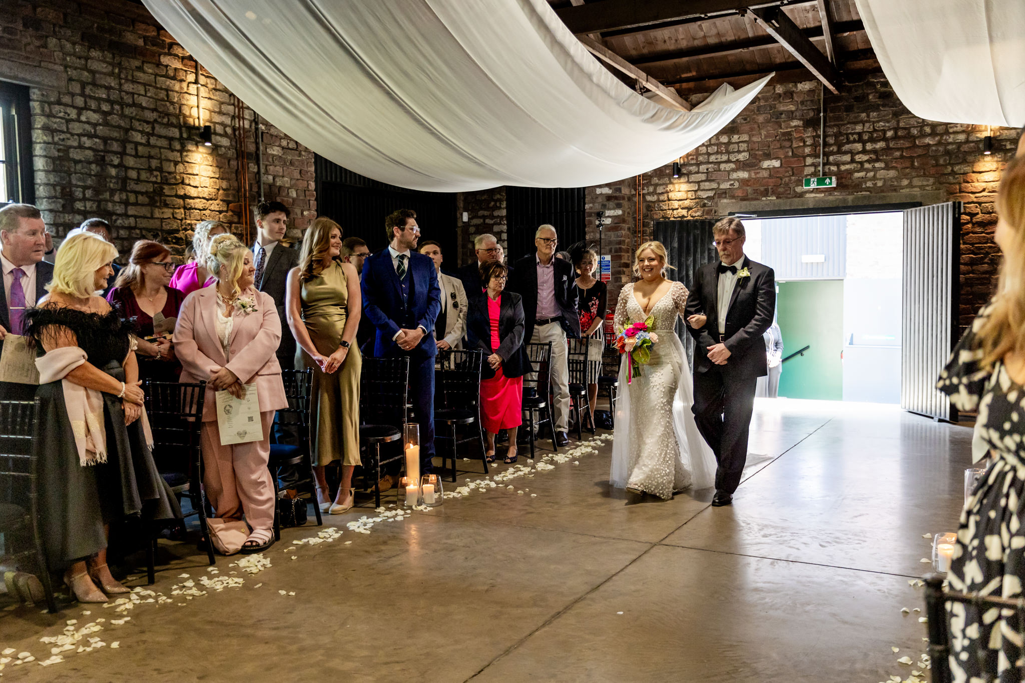 bride walking up the aisle at a wedding at The Engine Works, Glasgow 