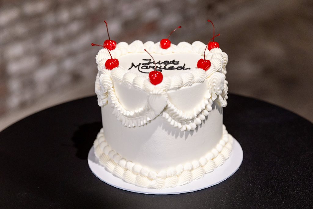 a white heart shaped cutting cake for a Glasgow wedding