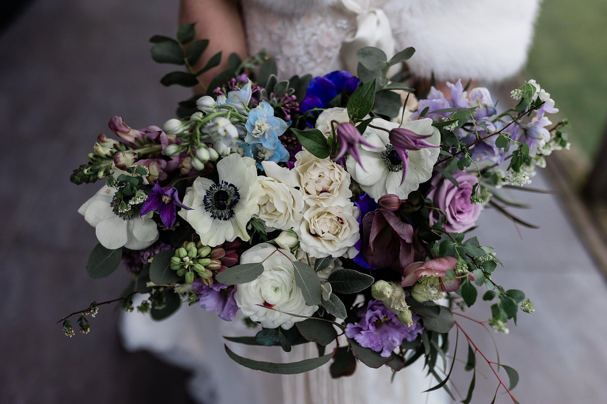 blue, cream and lilac flowers in a wedding bouquet