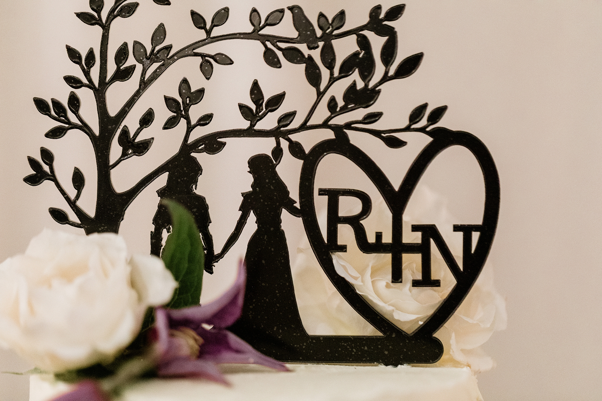 die-cut elven theme cake topper with.a tree