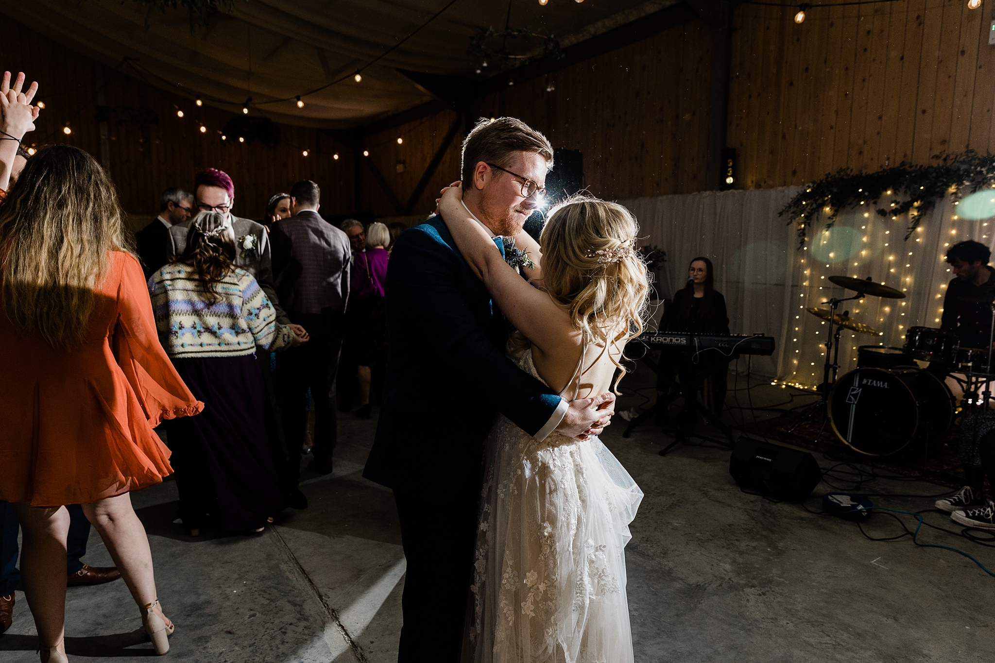 bride and groom dancing together at a barn wedding at Carrick Castle Estate in Scotland