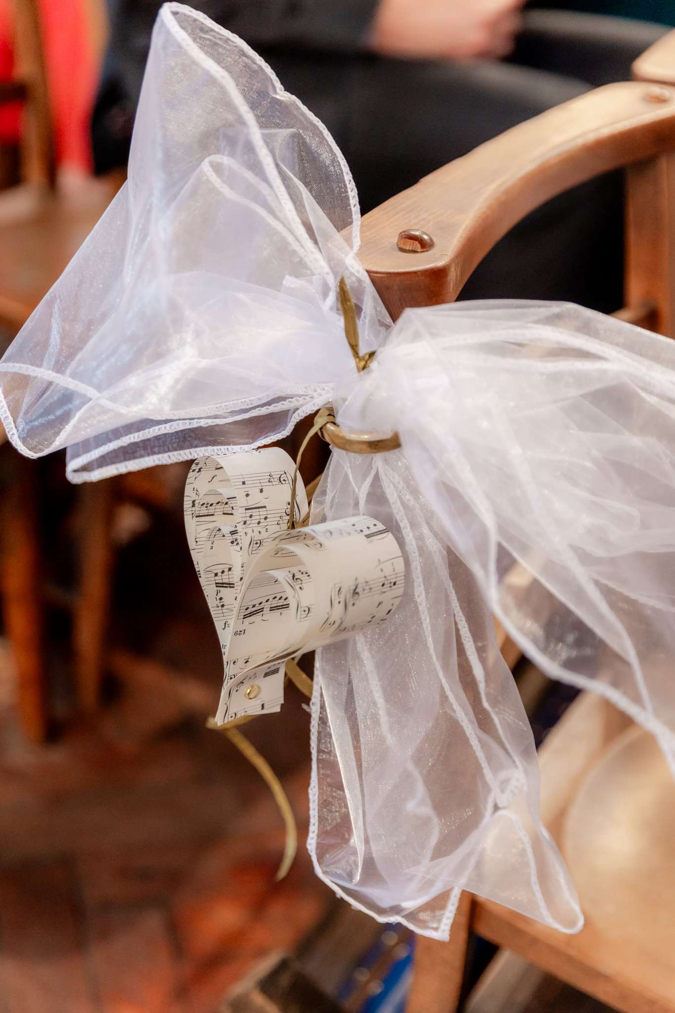 white organza bow and music manuscript love heart decoration 