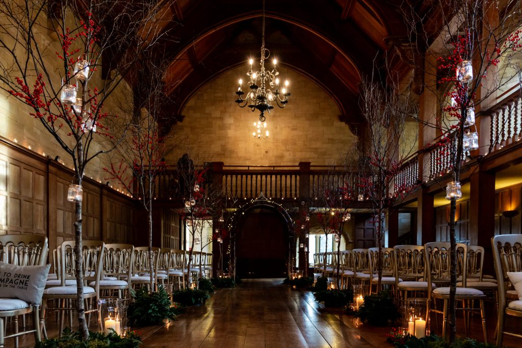interior of the the ballroom set up for a wedding ceremony at Achnagairn Castle, a luxury wedding venue near Inverness Scotland