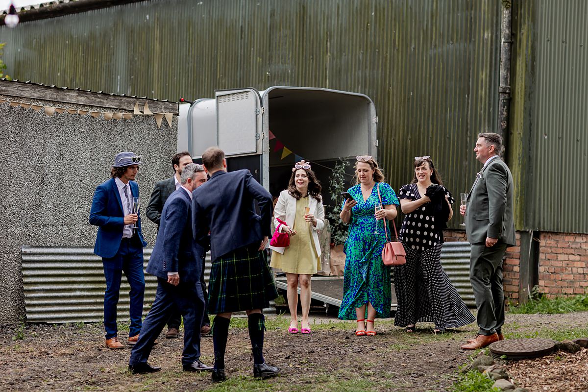 wedding guests at a family farm in Scotland