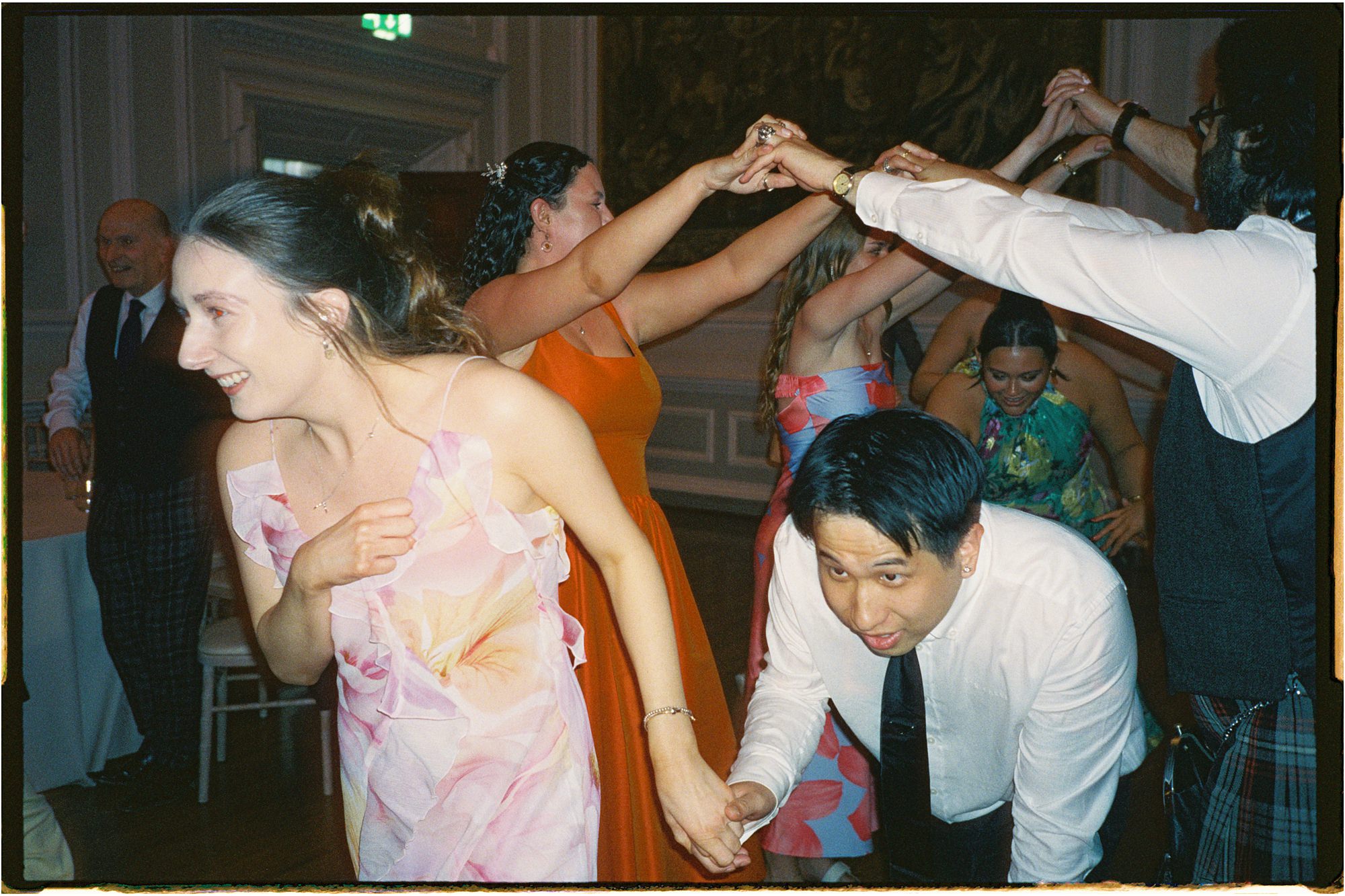 35mm film photo of guests dancing at Hopetoun House wedding